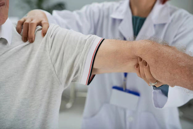 Chiropractor performing precision arm and wrist adjustment at The Shift Chiropractic